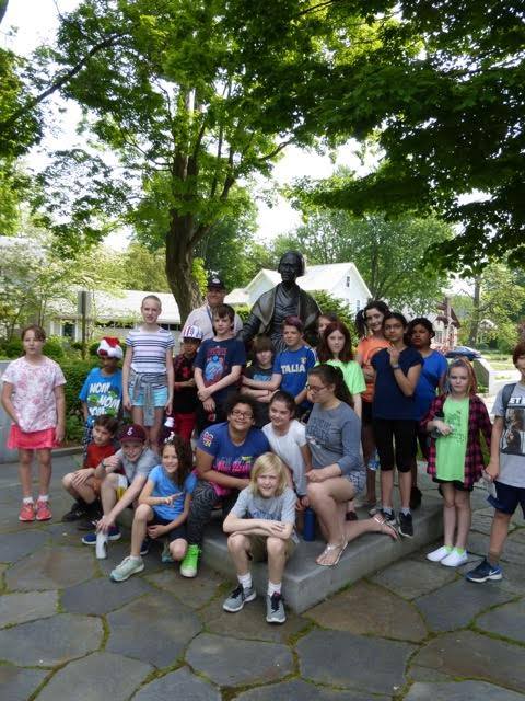 Students gather for a photo with the Sojourner Truth statue.